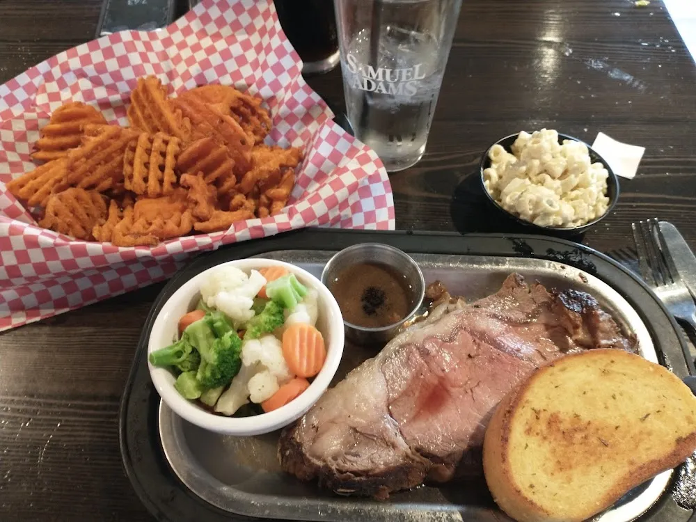Small Prime Rib w Steamed Broccoli and Macaroni Salad Sweet Potato Fries